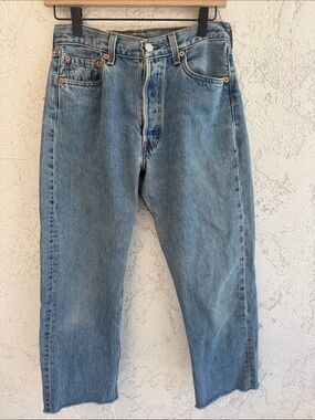 Levi's women’s Relaxed 501s Light Blue Denim distressed hem Jeans size 30
